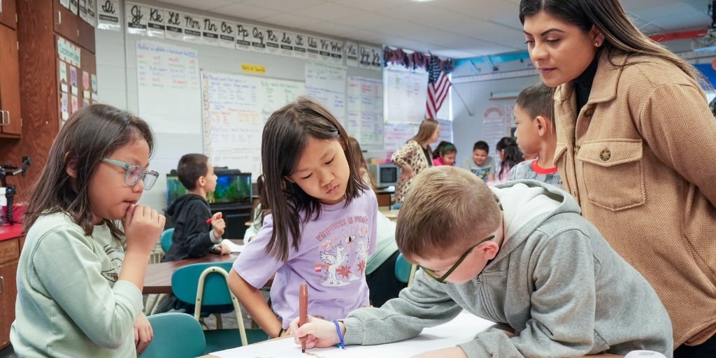 Teacher with students Write for Us